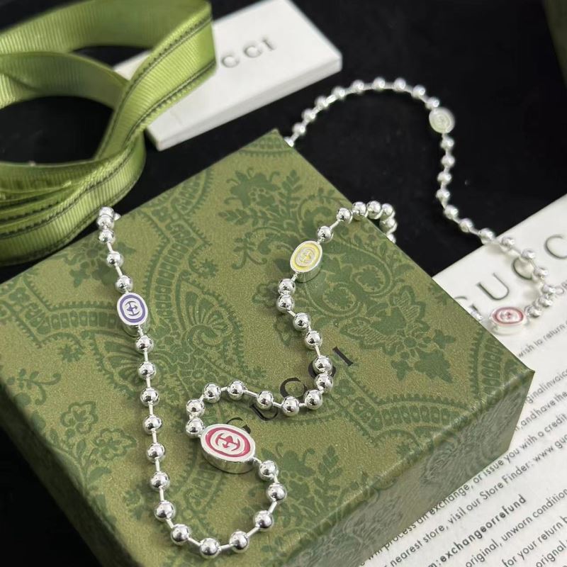 G*u*i necklaces